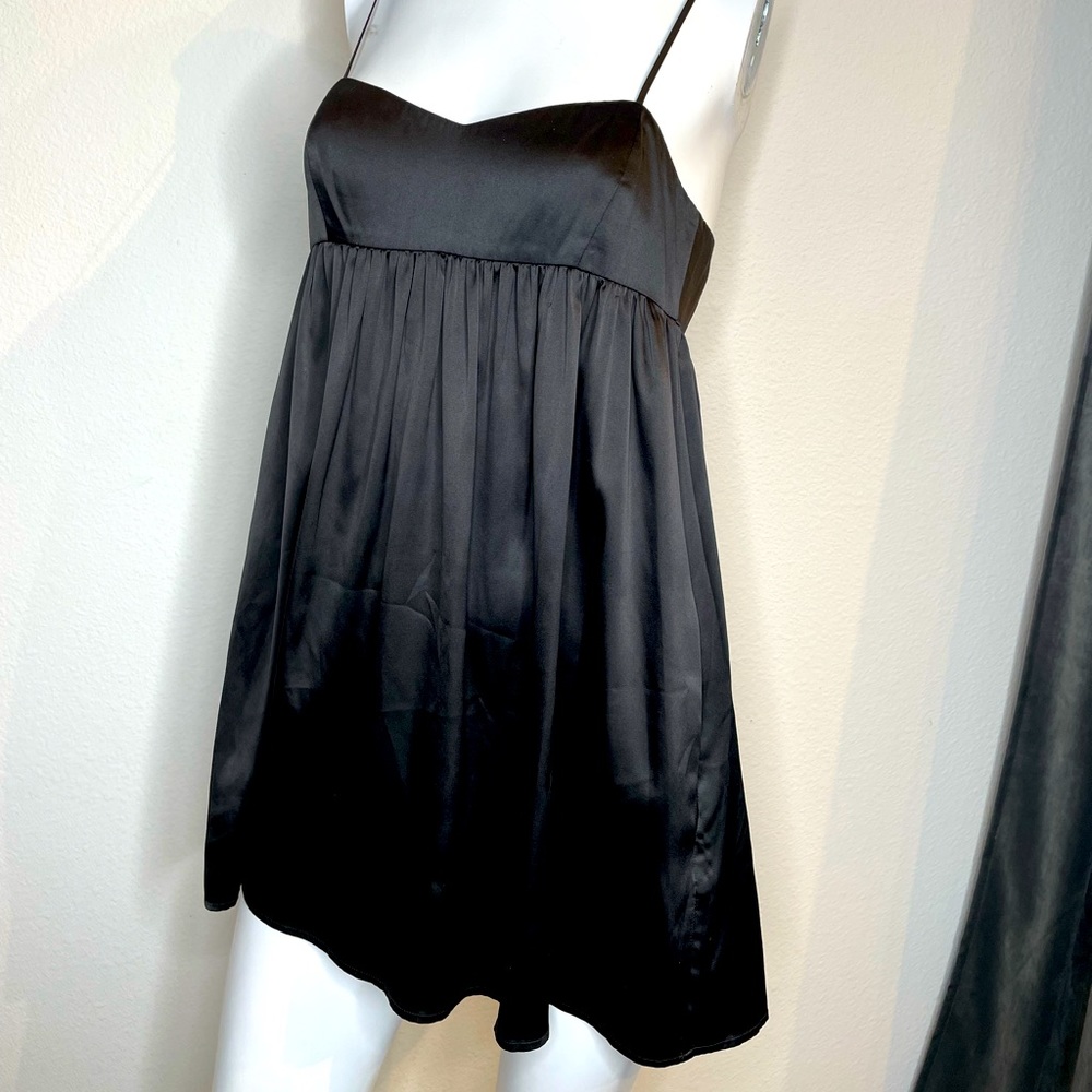 Satin mini dress with adjustable straps and pockets!